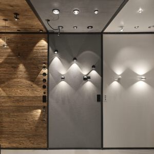 Der Beleuchtungs-Stand von Heimatlicht zeigt drei verschiedene Beleuchtungsoptionen: Holz, Beton und weißer Loft Style
